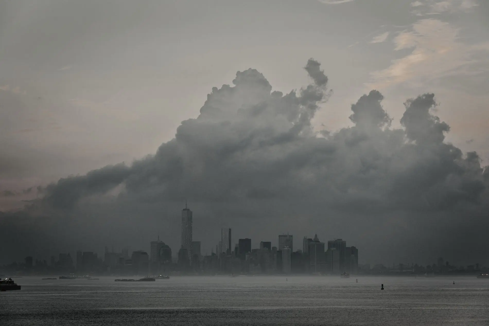 Lower Manhattan under storm clouds